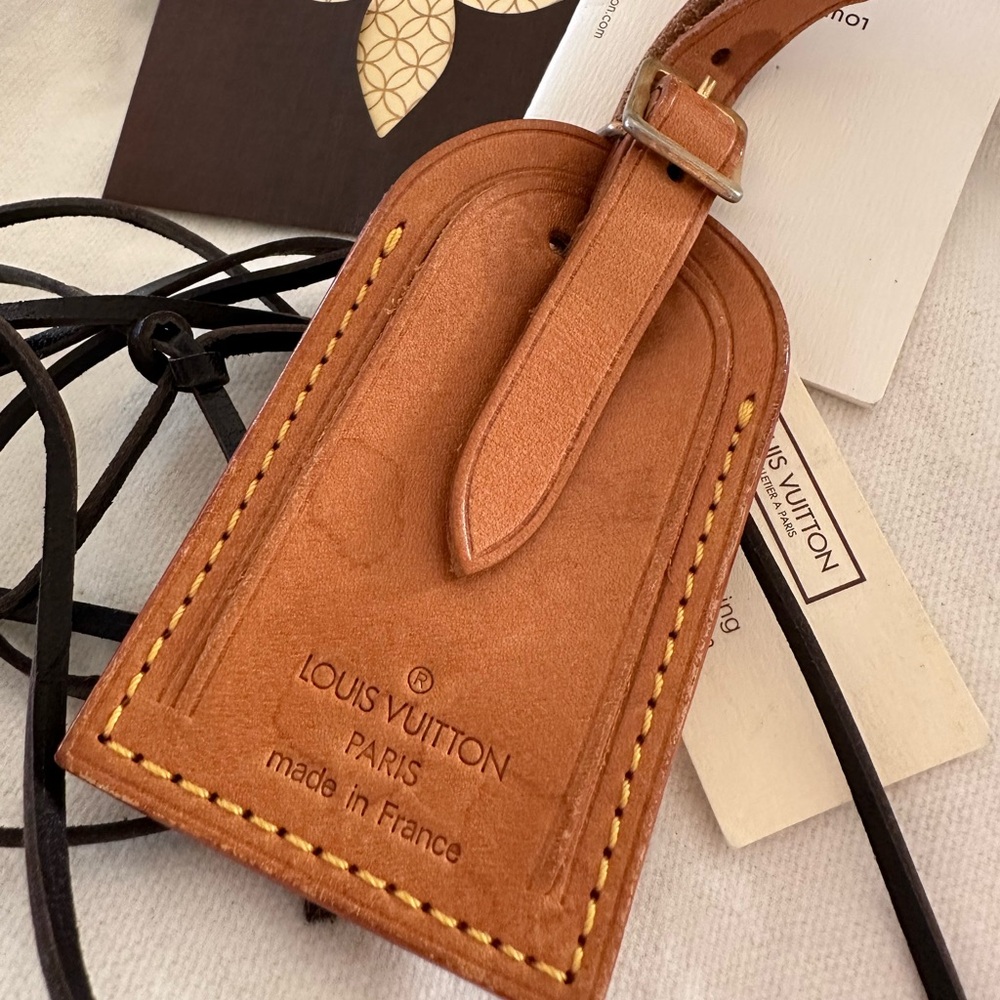 Sale price no offers Louis Vuitton Tan Leather luggage tag